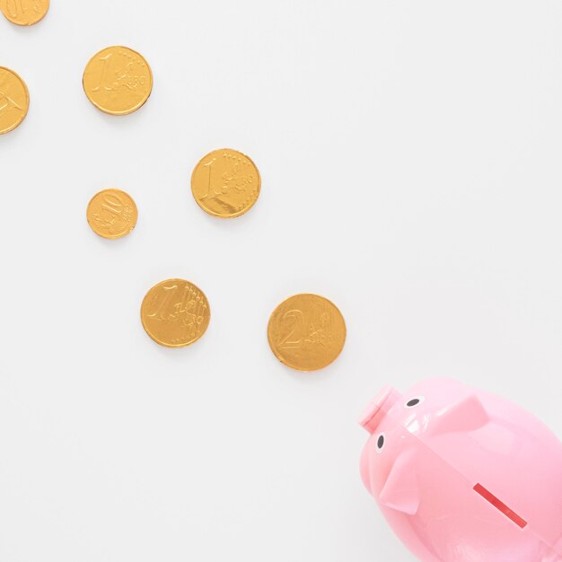 Free Photo piggy bank eating coins