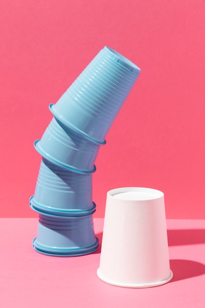 Pile of blue cups and paper cup