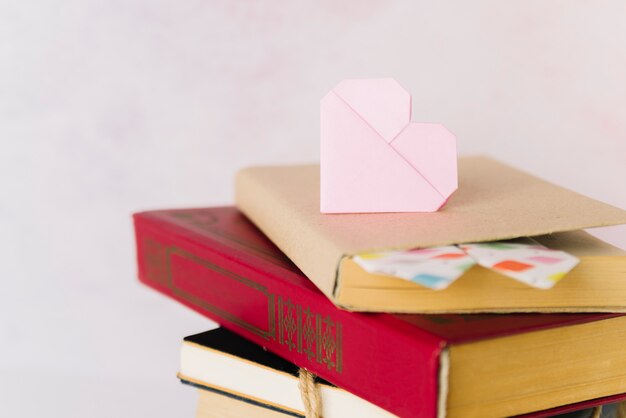 Pile book with origami heart