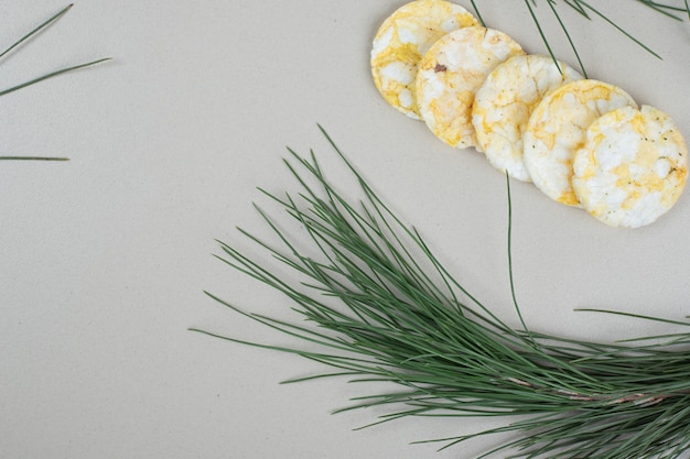 Pile of puffed rice cakes on gray surface