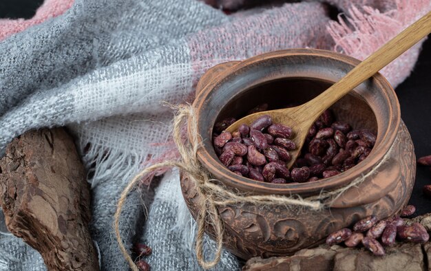 Pile of raw red beans in classic mug