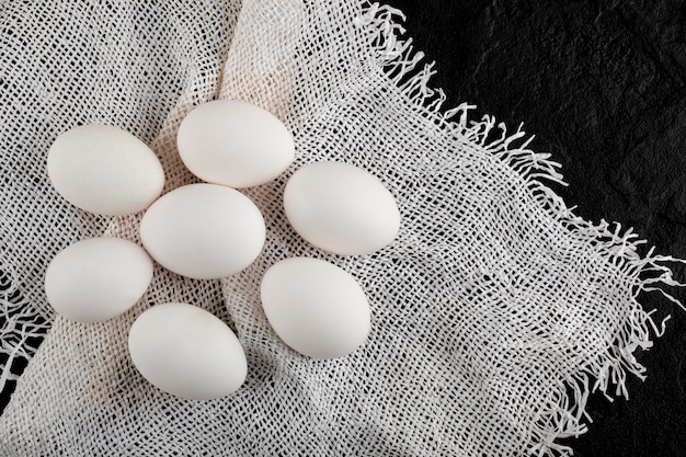 pile-uncooked-fresh-eggs-burlap_114579-53690.jpg