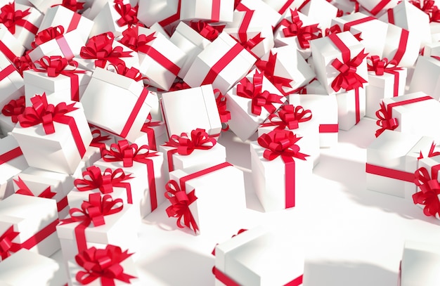 Free photo pile of white gift boxes with red ribbons on a white background