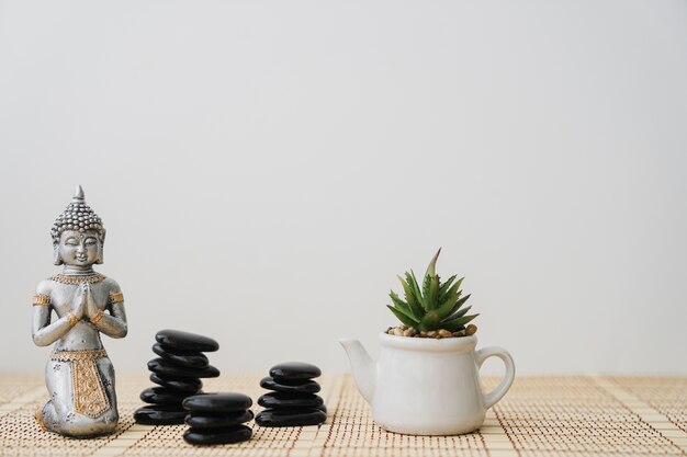 Piles of volcanic stones and buddha