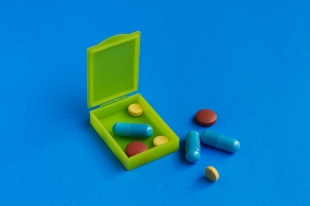 Free photo pill box arrangement still life