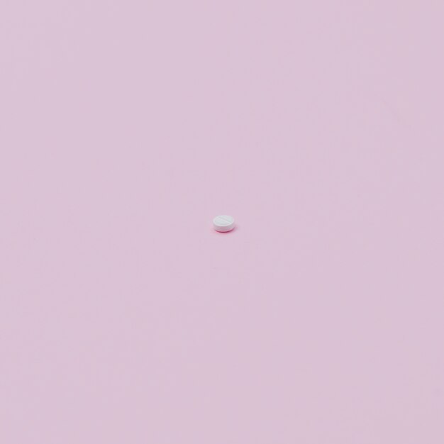 Pill on pink background