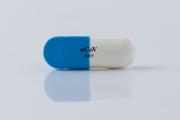 Pill for viral disease on a white background