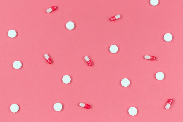 Pills aligned on desk