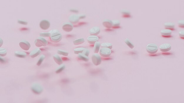 Pills arrangement on pink background