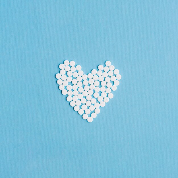 Pills forming heart