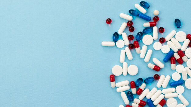 Pills frame on blue background