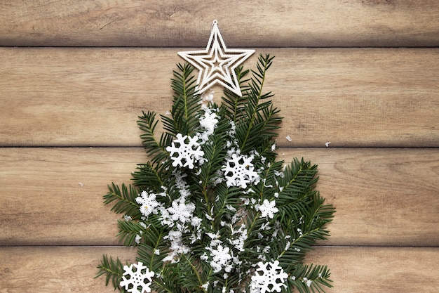 Pine branches with snowflakes