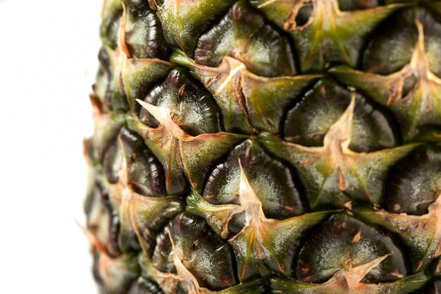 Pineapple fresh mellow juicy isolated on a white desk