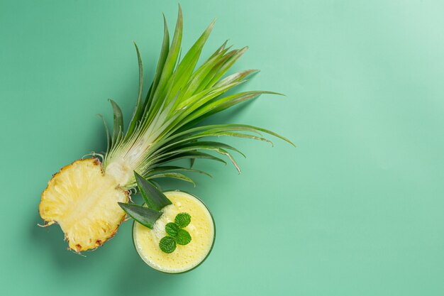 Pineapple juice on green surface