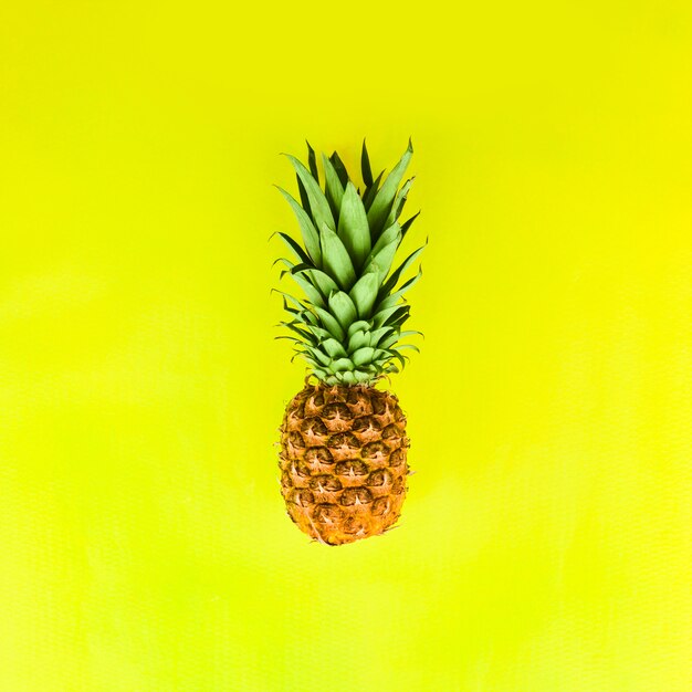 Pineapple with green leaves