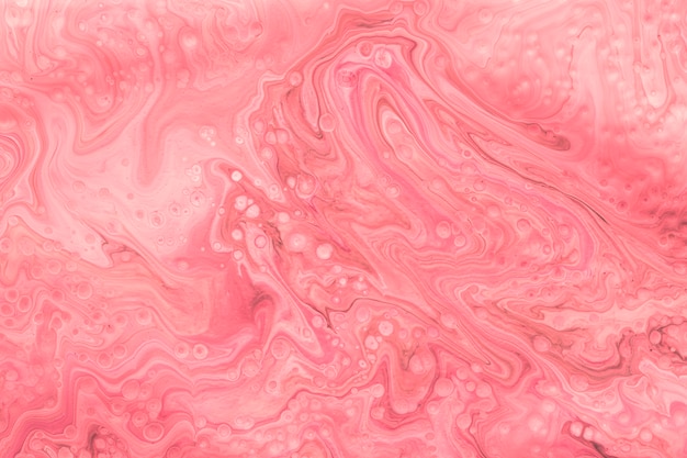 Pink abstract mixed paint background