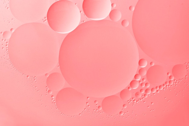 ピンクの背景の壁紙抽象的なオイルバブルテクスチャ