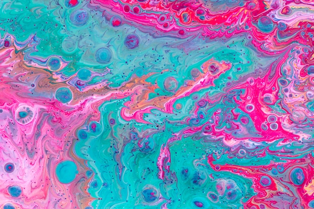 Pink and blue abstract mixed paint background