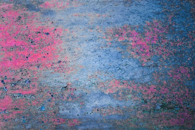 Pink and blue aged metal background