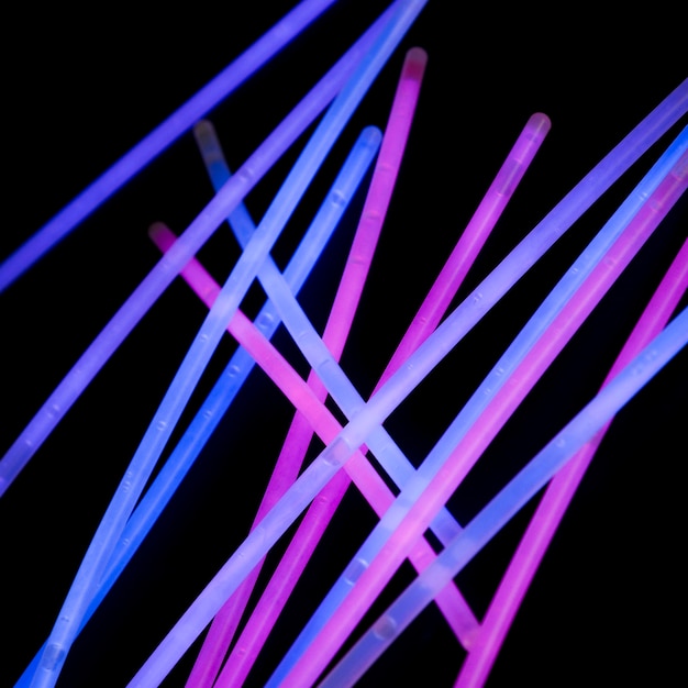 Pink and blue light tube on black background