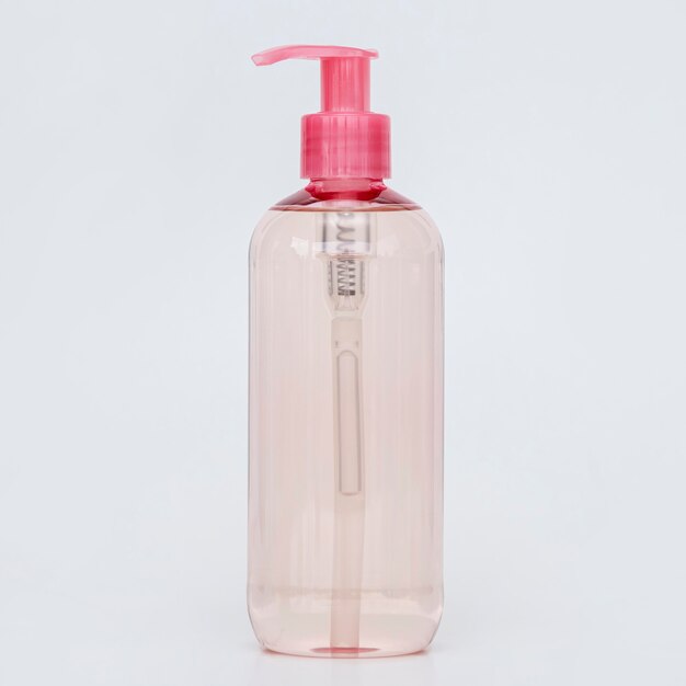 pink bottle of liquid soap
