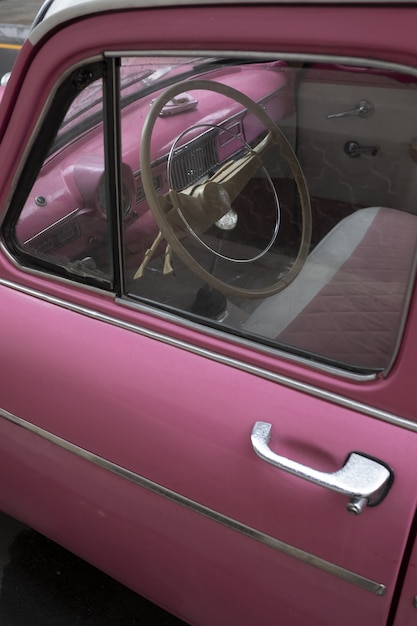 Pink car closer look to the old car