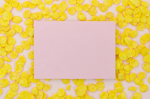 Pink card surrounded by cornflakes