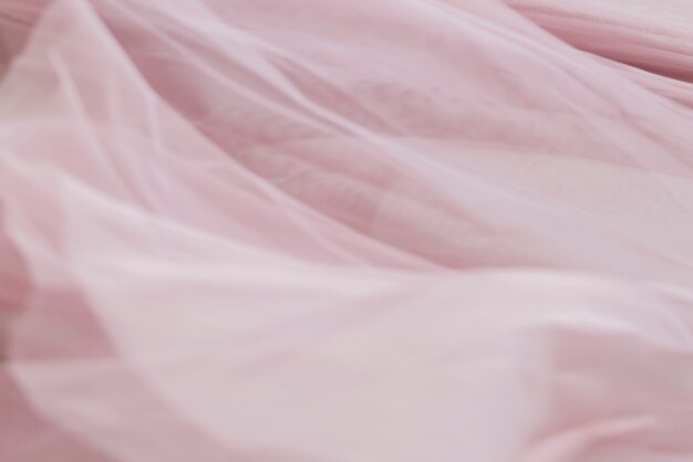 Розовая шифоновая ткань текстуры фона