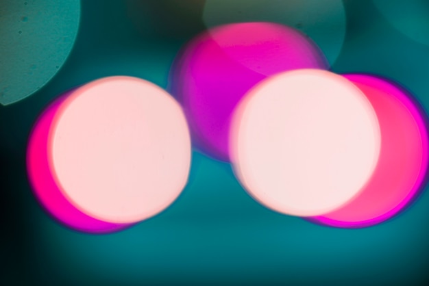 Бесплатное фото Розовый круговой фон неоновых огней