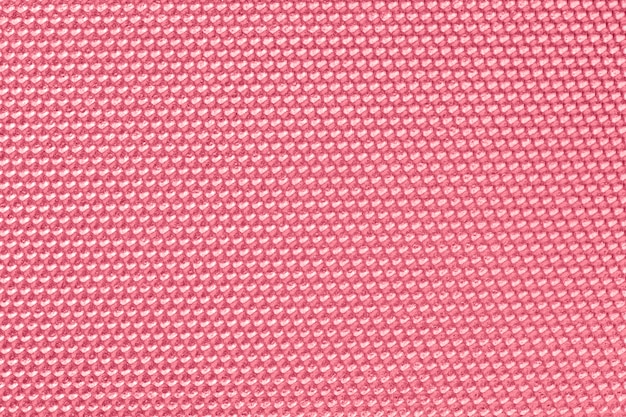 Free photo pink colored honeycomb pattern wallpaper