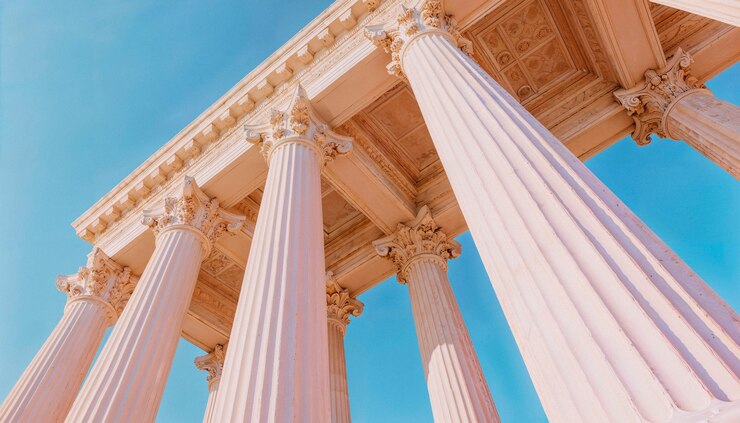 Free Photo pink columns under blue sky