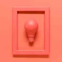 Free photo pink composition with lamp in frame on colored surface