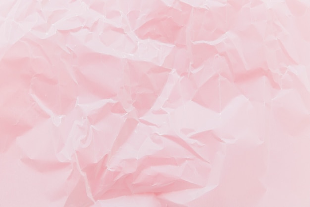 Free photo pink crinkled paper texture