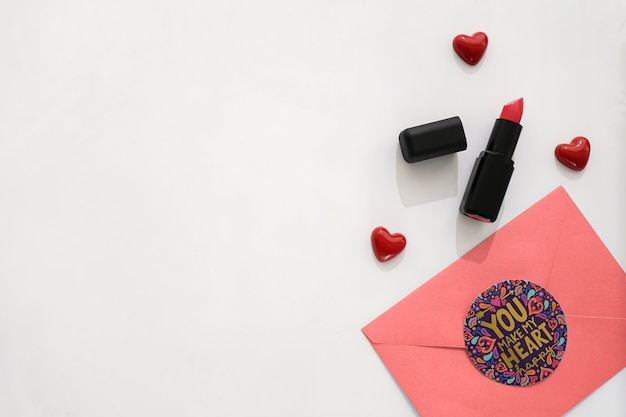 Pink envelope and lipstick