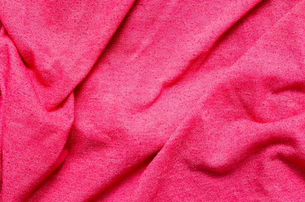 Pink fabric close-up background