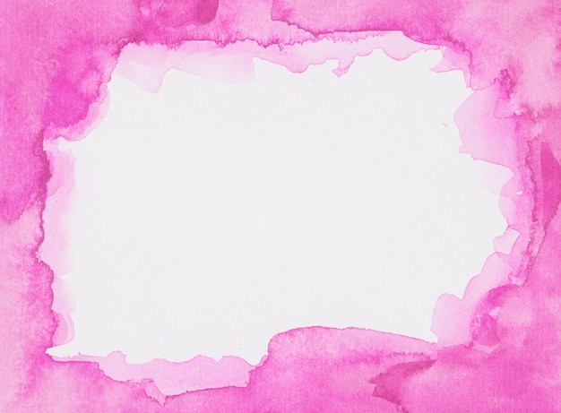 Free photo pink frame of paints on white sheet