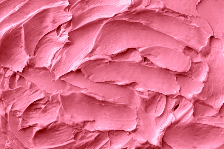 Free Photo pink frosting texture background close-up