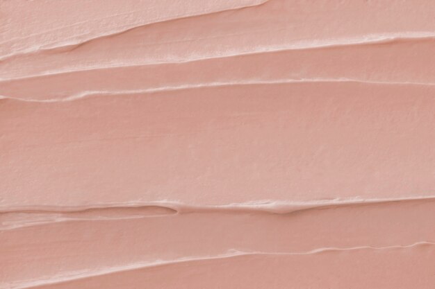 Pink frosting texture background close-up