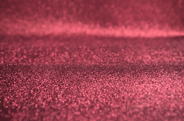 Pink glitter gold bokeh lights background