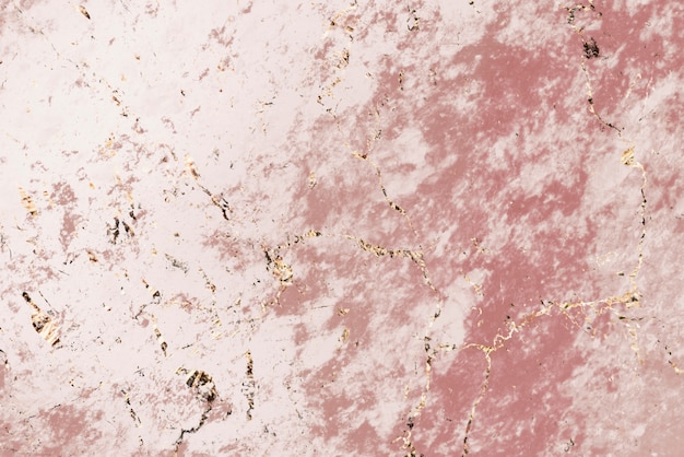 Free photo pink and gold marble textured background