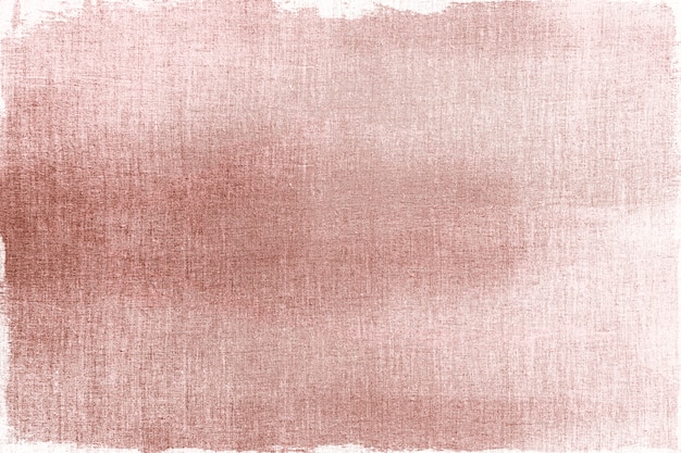 Pink gold painted on a fabric textured background