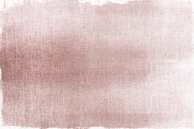 Free photo pink gold painted on a fabric textured