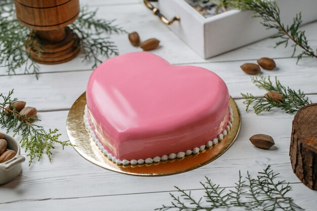 pink heart cake on the table