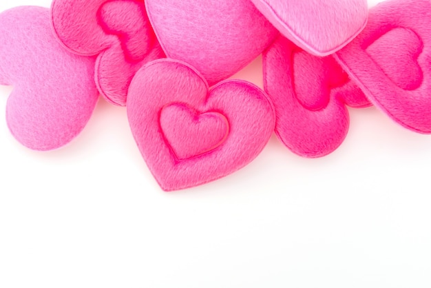 Pink Heart pillow on white background .