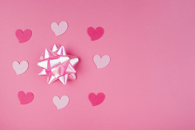 Pink hearts with pink bow and copy-space