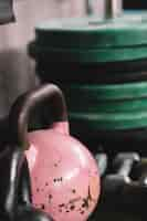 Free photo pink kettlebell in gym