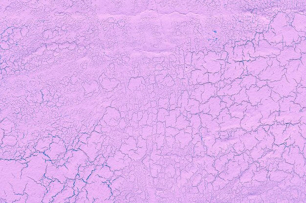 Pink lime plaster with cracks background