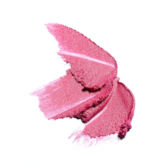 Pink lipstick brush stroke isolated on white