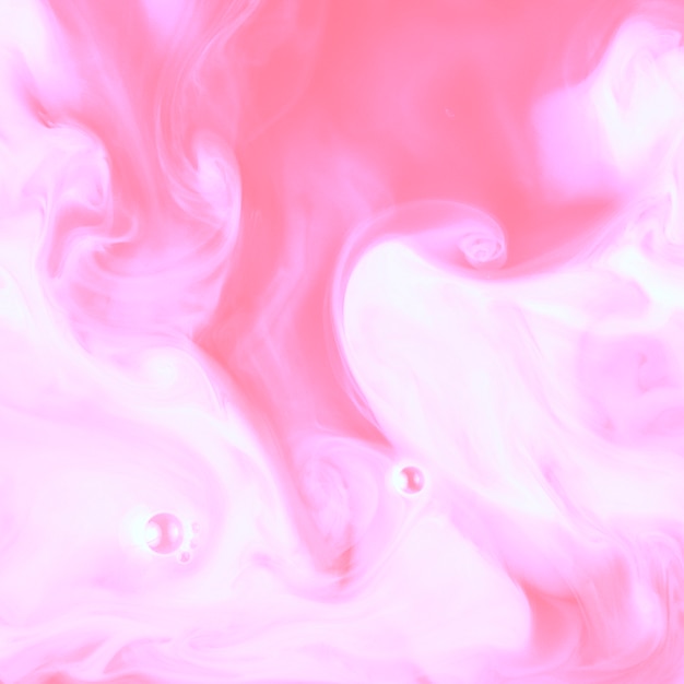 Розовая жидкая мраморная текстура