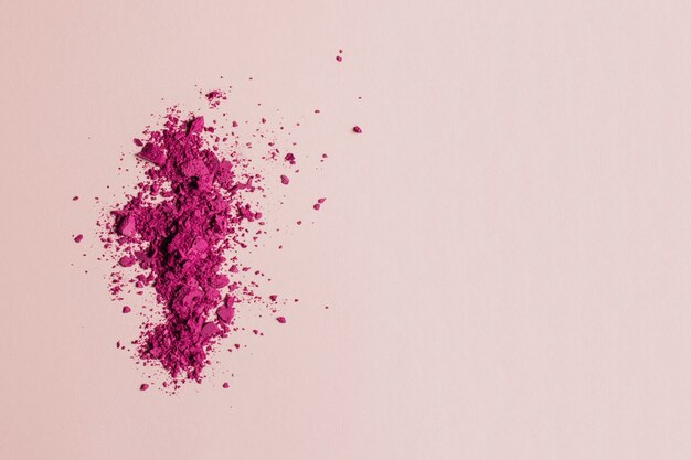 Pink make up powder with space on right